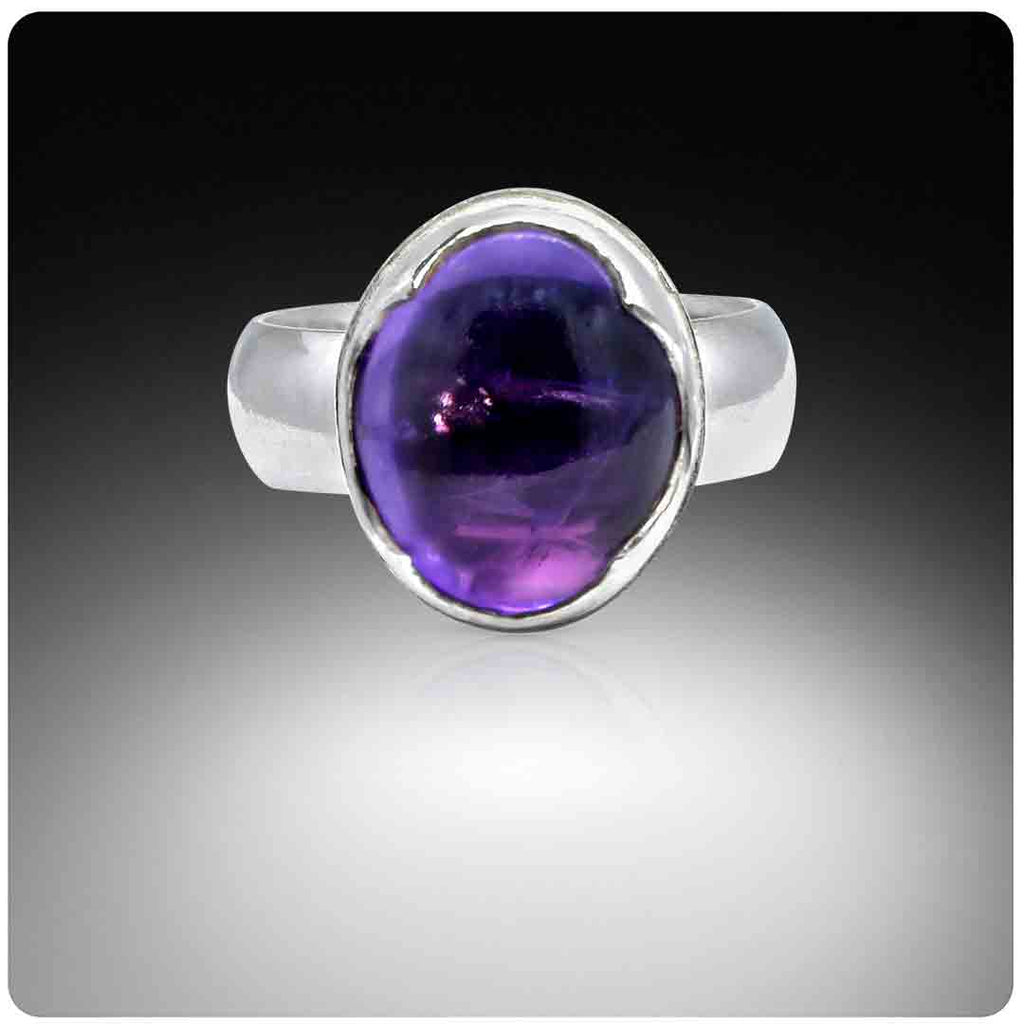 Silver ring with amethyst on a gradient background